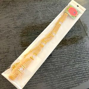 Delicate goldtone metallic link chain necklace with crystals. NEW in package.